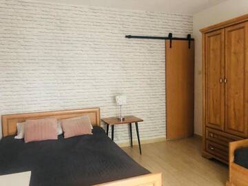 Фото номера Трехместный номер с ванной комнатой Проживание в семье Pokoje Gościnne i Apartamenty Ula г. Устроне-Морске 4