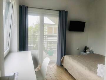 Фото номера Двухместный номер с 1 кроватью Проживание в семье Pokoje Gościnne i Apartamenty Ula г. Устроне-Морске 25