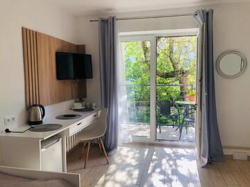 Фото номера Трехместный номер «Комфорт» Проживание в семье Pokoje Gościnne i Apartamenty Ula г. Устроне-Морске 4