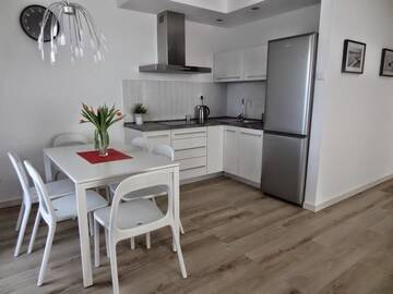 Фото номера Апартаменты с видом на бассейн Апартаменты Rezydencja Apartamenty Ostrowski г. Устроне-Морске 8